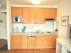 Kuchyň nebo kuchyňský kout v ubytování Ferienwohnung Beach Loft im Haus Kühlung