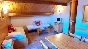 Postel nebo postele na pokoji v ubytování Le Floralp