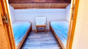 Postel nebo postele na pokoji v ubytování Le Floralp