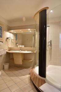 Ett badrum på Hotel Tettola