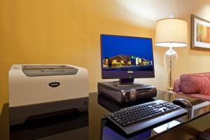 a desktop computer and a printer and a lamp at Holiday Inn Express Hotel & Suites Cleveland-Streetsboro by IHG in Streetsboro