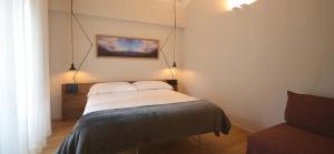 Postel nebo postele na pokoji v ubytování Albergo Centrale