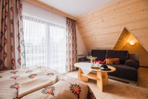 Postel nebo postele na pokoji v ubytování Willa Wrzos