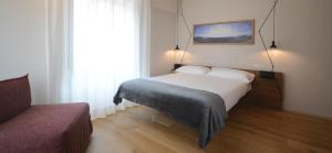 Postel nebo postele na pokoji v ubytování Albergo Centrale