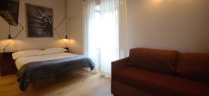 Postel nebo postele na pokoji v ubytování Albergo Centrale