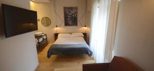 Postel nebo postele na pokoji v ubytování Albergo Centrale
