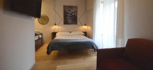 Postel nebo postele na pokoji v ubytování Albergo Centrale