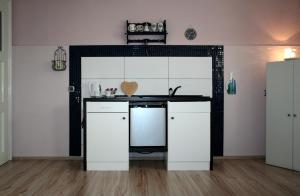 Kuchyň nebo kuchyňský kout v ubytování Apartments ABA Zagreb