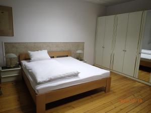 Postel nebo postele na pokoji v ubytování Penzion Leticia