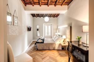 Posteľ alebo postele v izbe v ubytovaní Trevi Fountain Superior 3 bdr apartment