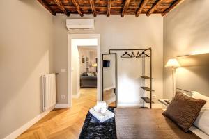 Posteľ alebo postele v izbe v ubytovaní Trevi Fountain Superior 3 bdr apartment