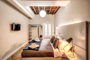 Televízia a/alebo spoločenská miestnosť v ubytovaní Trevi Fountain Superior 3 bdr apartment