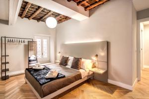 Posteľ alebo postele v izbe v ubytovaní Trevi Fountain Superior 3 bdr apartment