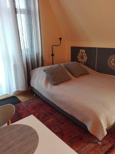 Cama o camas de una habitación en Pokoje Jola Zakopane