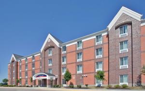 an image of a red brick building at Candlewood Suites Olathe, an IHG Hotel in Olathe