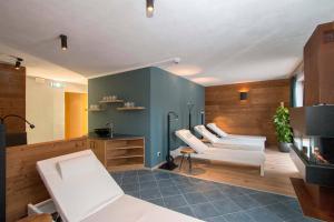 Łóżko lub łóżka w pokoju w obiekcie Gurglhof Apartmenthaus