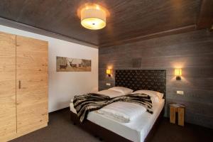 Łóżko lub łóżka w pokoju w obiekcie Gurglhof Apartmenthaus