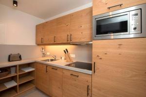 Kuchnia lub aneks kuchenny w obiekcie Gurglhof Apartmenthaus