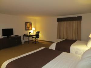 Voodi või voodid majutusasutuse Villegiature Deux Rivieres Resort toas