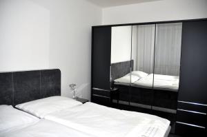 Letto o letti in una camera di Hotel Steiger