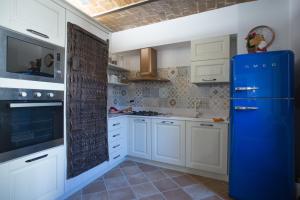 Kuchnia lub aneks kuchenny w obiekcie B&B BONE NOVELLE dimora storica palazzo zuzi