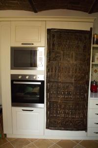 Kuchnia lub aneks kuchenny w obiekcie B&B BONE NOVELLE dimora storica palazzo zuzi