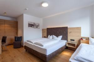 Posteľ alebo postele v izbe v ubytovaní Apart-Hotel Dreisonnenhof