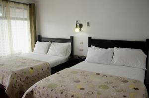 Postel nebo postele na pokoji v ubytování Hotel Cielo Azul Resort + 37 fotografií