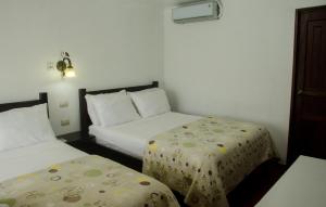 Postel nebo postele na pokoji v ubytování Hotel Cielo Azul Resort