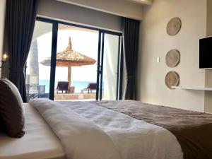 Postel nebo postele na pokoji v ubytování Meraki Oasis Hotel + 78 fotografií