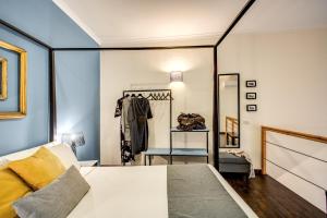 A bed or beds in a room at Casa Hosteno
