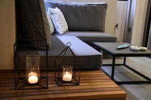 A bed or beds in a room at ATHENS PHOS Brand New Loft in Historical Athens Historical Center