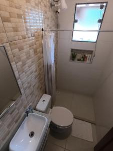 Koupelna v ubytování Recanto Guarassol Apartamentos