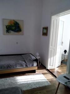 Uma cama ou camas num quarto em Citadela
