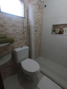 Koupelna v ubytování Recanto Guarassol Apartamentos