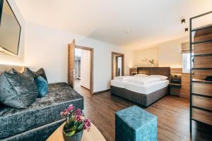Postel nebo postele na pokoji v ubytování FOXY Obertauern + 31 fotografií