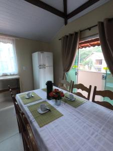 Postel nebo postele na pokoji v ubytování Recanto Guarassol Apartamentos