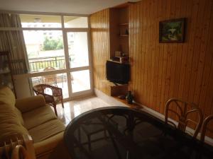 A television and/or entertainment centre at Residencial Peñiscola Playa 6 LEK