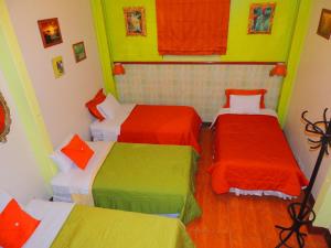 Cama ou camas em um quarto em Lima Wari Hotel Boutique