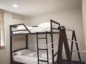 Postel nebo postele na pokoji v ubytování More than Sleep Hostel Pak Chong-Khao yai