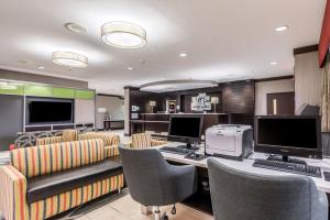 an office with a desk with two computers and chairs at Holiday Inn - Indianapolis Downtown, an IHG Hotel in Indianapolis