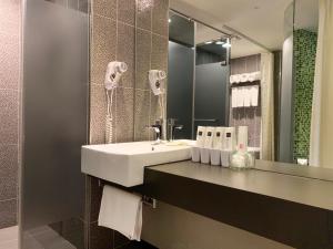 Koupelna v ubytování Wholesome Hotel
