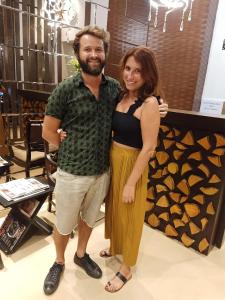 a man and woman posing for a picture in a store at The Fountain Inn - Fort in Mumbai