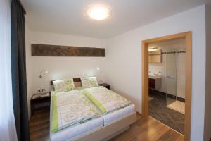 Cama o camas de una habitación en Appartement Neumayer