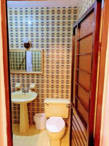 Ett badrum på HOTEL CASA D'LINA CENTRO