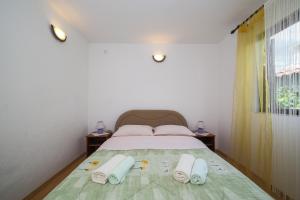 Postel nebo postele na pokoji v ubytování Holiday home Sego