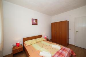 Postel nebo postele na pokoji v ubytování Holiday home Sego