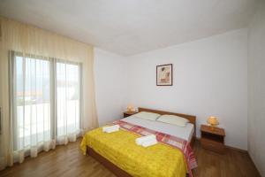 Postel nebo postele na pokoji v ubytování Holiday home Sego