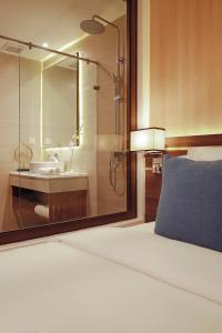 Postel nebo postele na pokoji v ubytování Seana Hotel