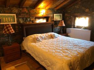 Ένα ή περισσότερα κρεβάτια σε δωμάτιο στο Filoxenia 1 & 2